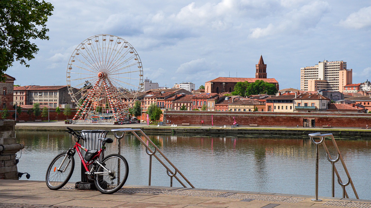 Image showing a canal and ferris wheel in Toulouse, France.