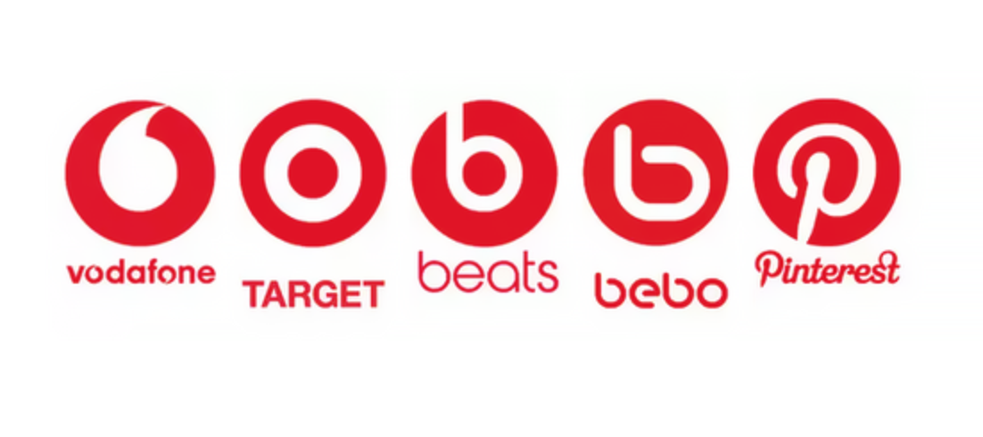 An image showing five red and white logos, including Target and PInterest. 